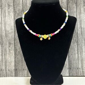 Colorful Beaded Necklace with Smiley Charm
